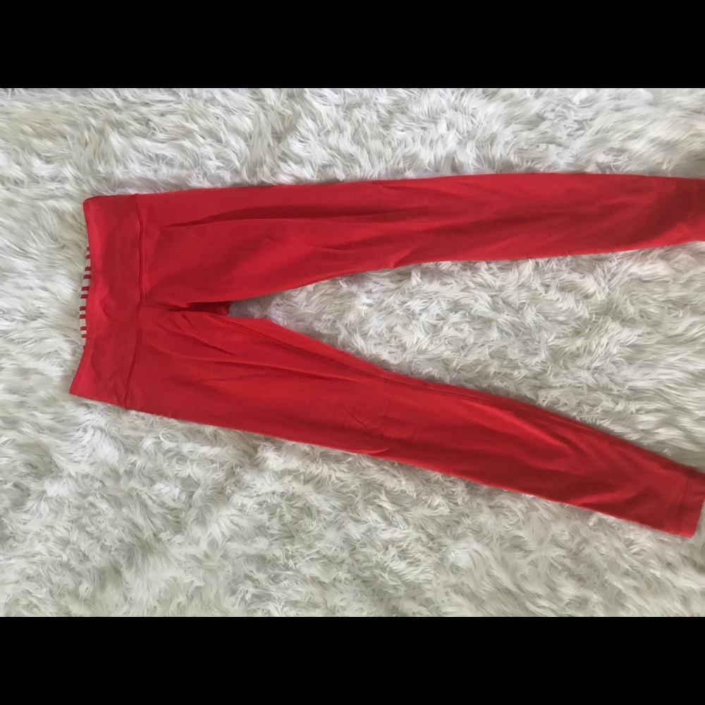 Orange coral colored lulu lemon leggings